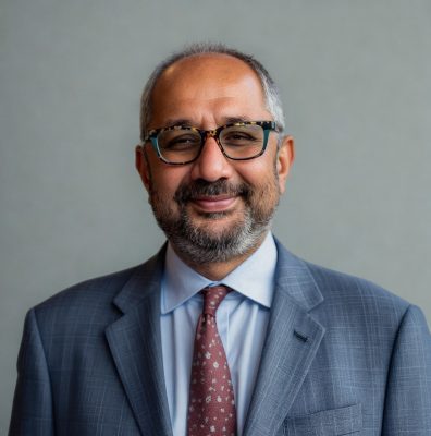 Babur Mian wearing a suit.