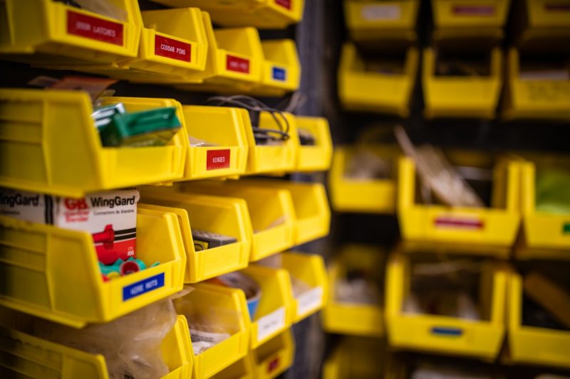 Details in the BuildLAB. Yellow bins containing tools.